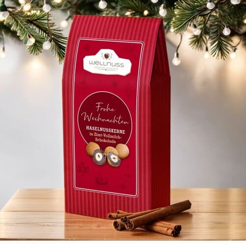 Weihnachts Edition - Haselnusskerne in Vollmilch-Zimt Schokolade in der Maxi-Faltschachtel