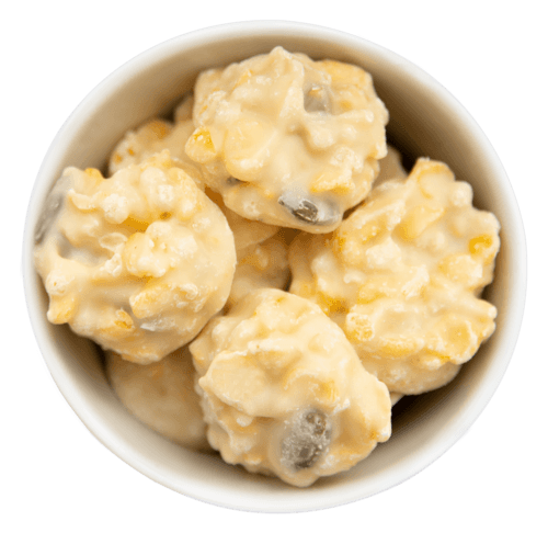 Schoko-Crispies mit weißer Schokolade, Kürbiskernen und Erdbeere in der Faltschachtel